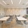 community room with large tables and ample seating